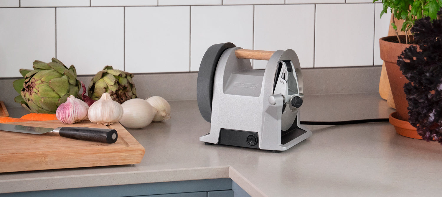 SharpeningSupplies.com - The Tormek T-1 Kitchen Knife Sharpener looks  great. The cast zinc body and oak handle make for a stylish example to  Swedish design. It will look great in your kitchen